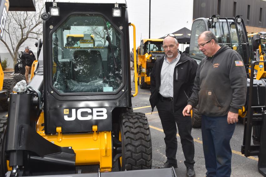 With the JCB skid steer is Steve Benoit (L) and John Patenaude, both of the city of Lowell DPW.