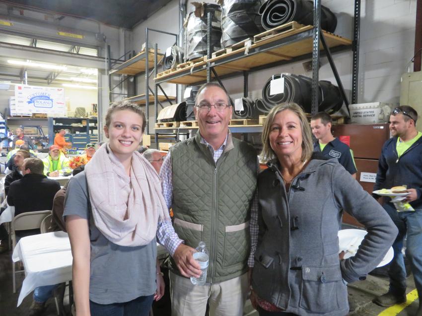 Enjoying the open house and 60th anniversary celebration (L-R) are Caitlin Glandon, Roland Machinery Co.; Chip Reyhan, president, Sangamo Construction; and Rachel Pennell, human resources manager, Roland Machinery Co.
