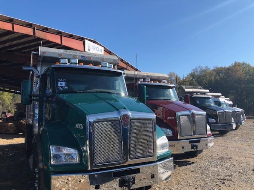 The auction featured a lineup of 2017 and 2018 Peterbilt dump trucks.