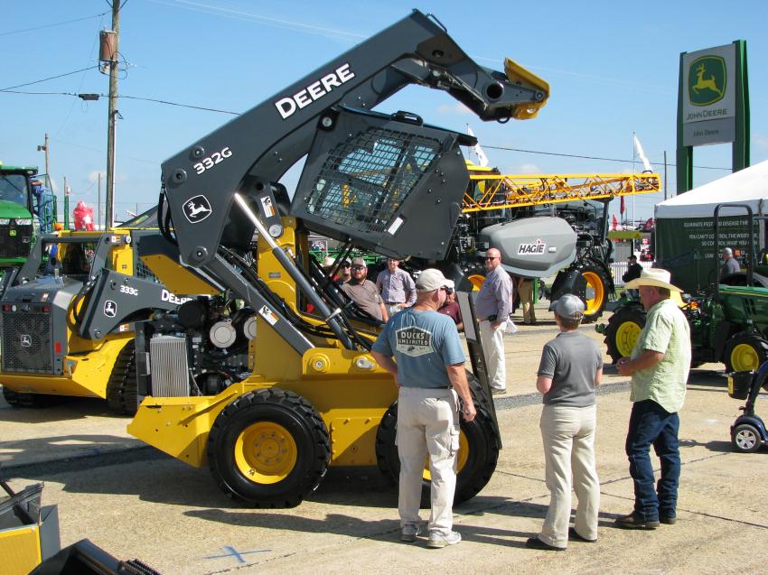 A Deere skid steer loader and compact track loader stood out in the sea of green in the John Deere exhibit. 