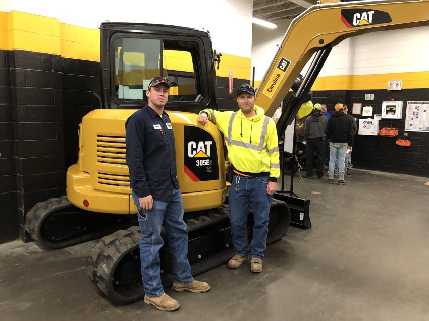 Chris Safriet (L) and Daniel Watts, both of D&R Watts Grading in Archdale, liked what they saw in this Cat 305E2 excavator.
