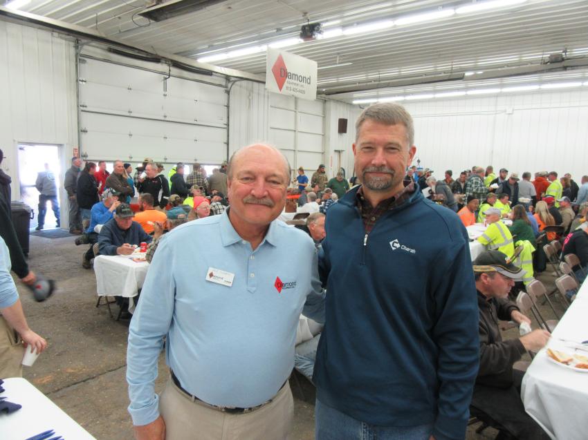 Diamond Equipment President Dave Clement (L) caught up with Charah LLC Fleet Manager Gavin Nawrocki at the open house. 
