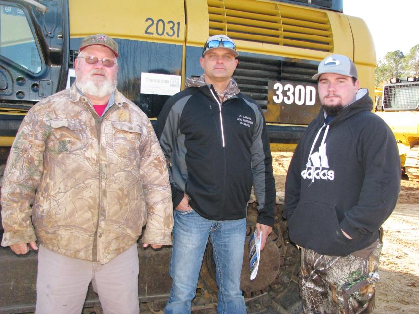 Developers at auction looking for some year-end deals (L-R) included Charlie Rives, Jason Little, and Trevor Johnson of JL Alabama Land Developers, Lowndesboro, Ala.