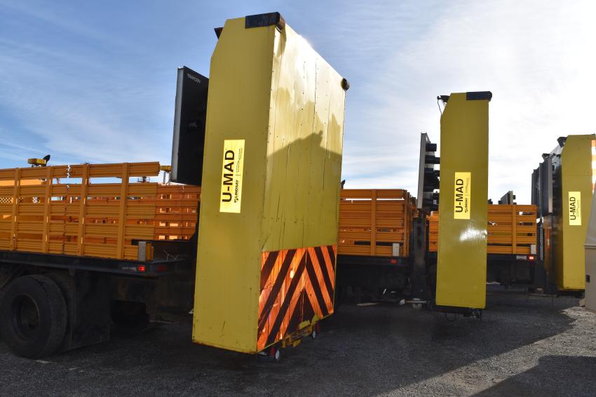 Attenuator trucks are lined up and ready for new owners.