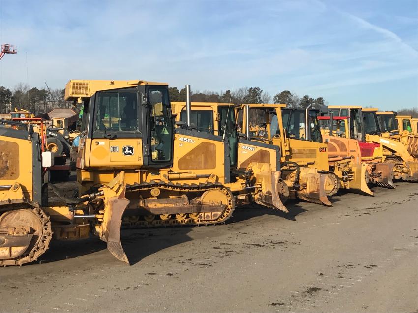 More than 2,100 lots were auctioned off, including Cat and John Deere dozers.