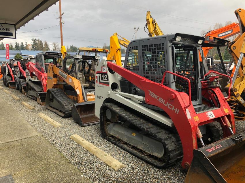 This auction featured a nice assortment of skid steers.

