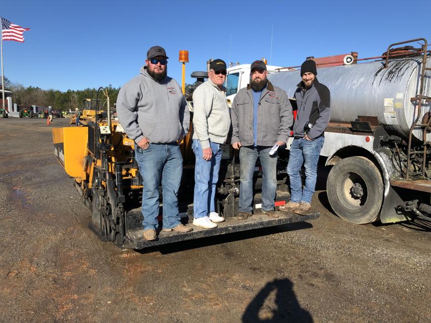 A LeeBoy 8515C paver caught the eye (L-R) of Brandon Ward, William and Justin Stepp and Gary Hill, all of Rock Solid Paving in Inman, S.C.