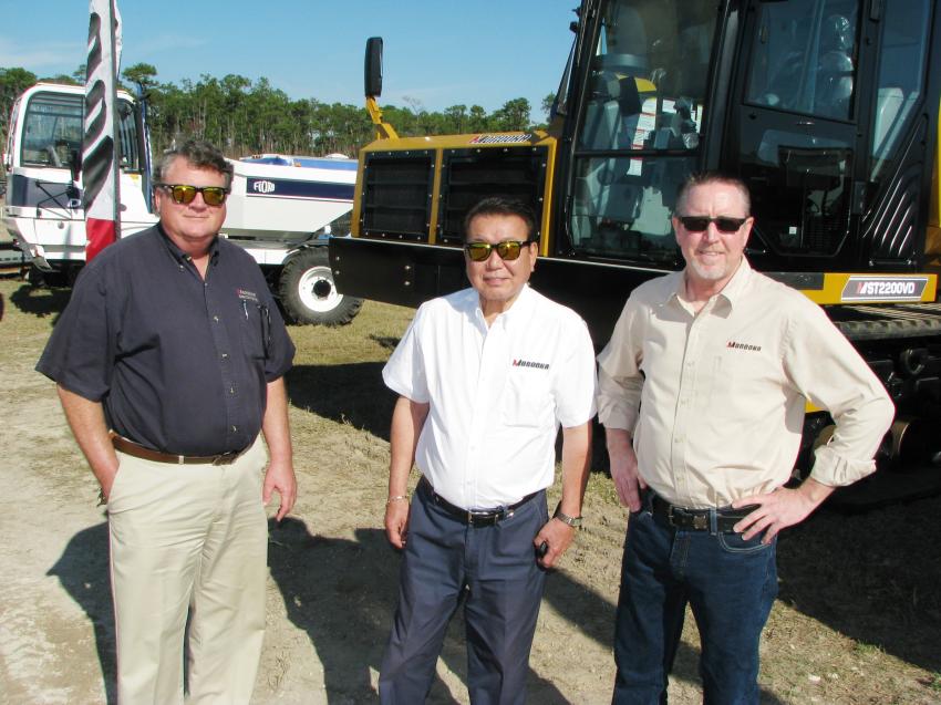 (L-R): Ken Byrd, Yoshi Tanaka and Chuck Norman brought out a great display of new products from Morooka, Fiori and Dominion Rubber Tracks to the Alex Lyon sale.  
