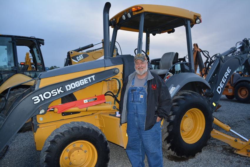 Darrell Henry of Palestine, Texas, works for 5J Oilfield Services, but said he would put this 310 SK Deere backhoe loader to work on his own property.
