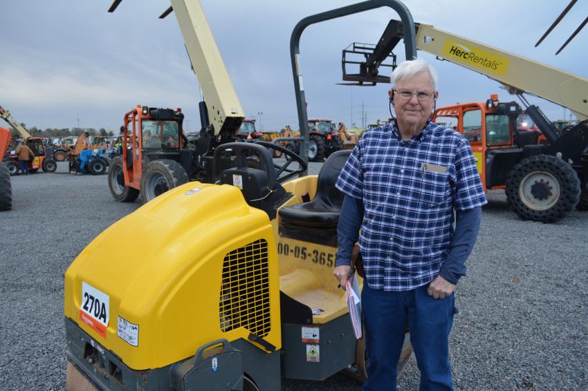 Mike Haughton, formerly a Ritchie Bros. employee in the early ’80s, now owns Haughton Equipment Services of Alma, Ark. Shown with a Wacker Neuson RD12 roller, Haughton said he was one of the first sales representatives in the United States for Ritchie Bros.
