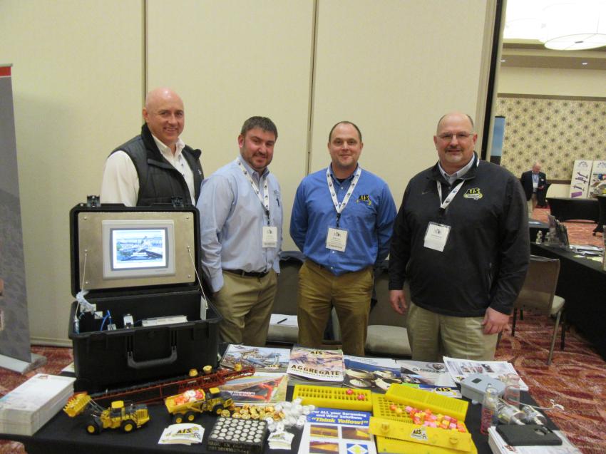 (L-R): AIS Construction Equipment’s Shawn O’Mara, Jeff Taylor, Matt Anson and Kevin Bushinski spoke with attendees about the dealership’s aggregate equipment parts, service, sales and rentals. 
