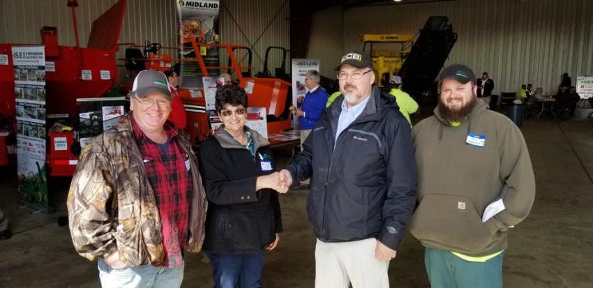Grand Prize winners received a free one-week paver rental. Bill Shaw (third from L), the Stephenson Equipment representative, posed with (L-R) Ron Miller, Merry Smith and Troy McHaffie at the expo.
