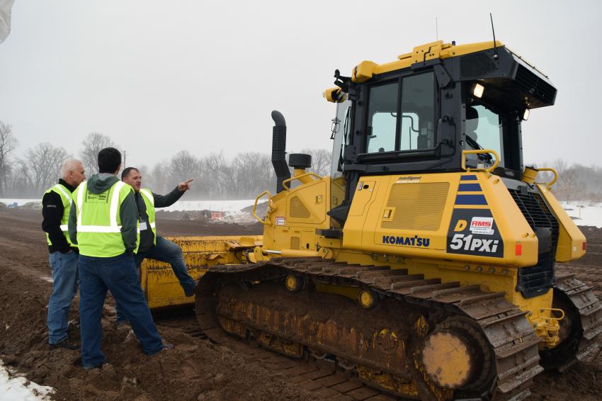 Phil Major of Road Machinery & Supplies Co. shows customers the Komatsu D51PXi-24 dozer.
