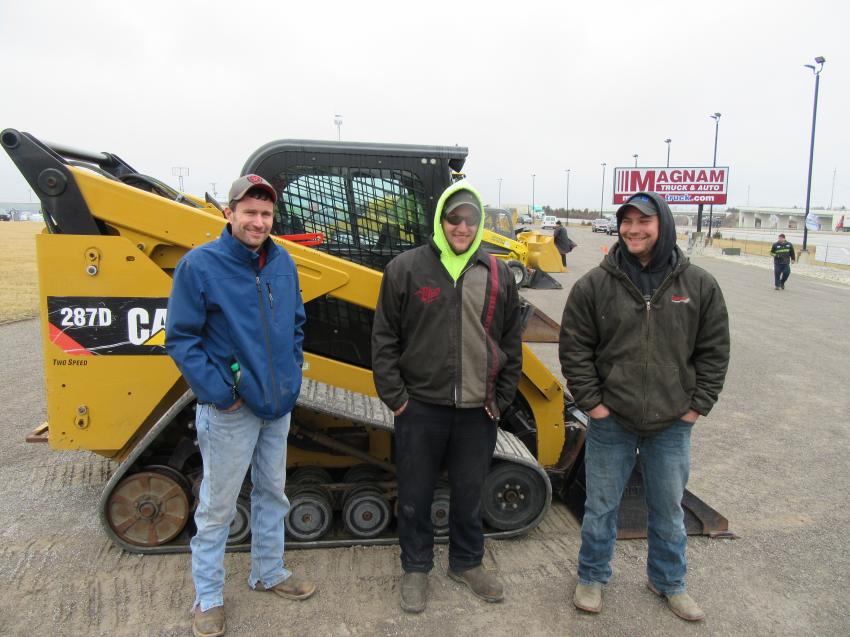 (L-R): Brian Will of Will Farms joined friends Joe Gable of Grow 2 Show It and Kyle Arn of Arn’s Acres to inspect a Cat 287D compact track loader and other equipment at the Lima auction.
