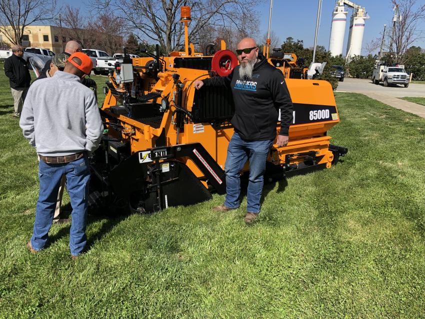 Gene Abernathy of Ferebee Corporation in Charlotte looks over a LeeBoy 8500, which offers variable paving widths up to 15 ft.
