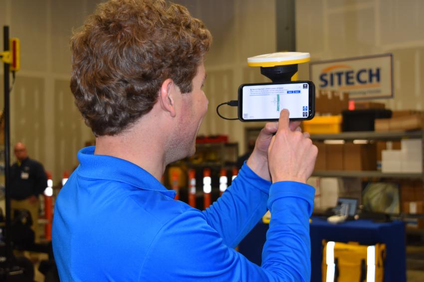 Alex Harrington, product specialist of Trimble, shows off the Trimble SiteVision, which will be released later this year.