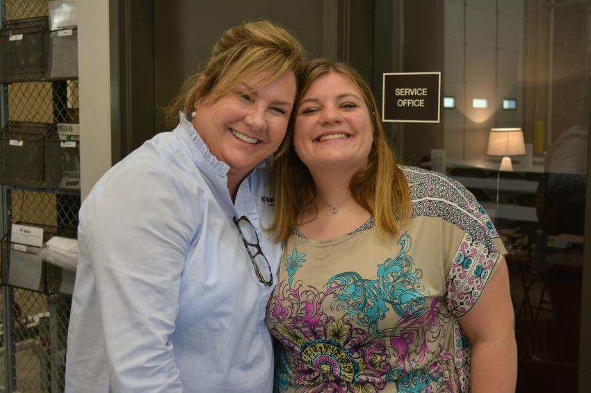 Longtime friends Ronette Coldwell (L) and Chelsea Hickerson enjoy the festivities at the open house. Coldwell is service administrator of Bobcat of Waco.
