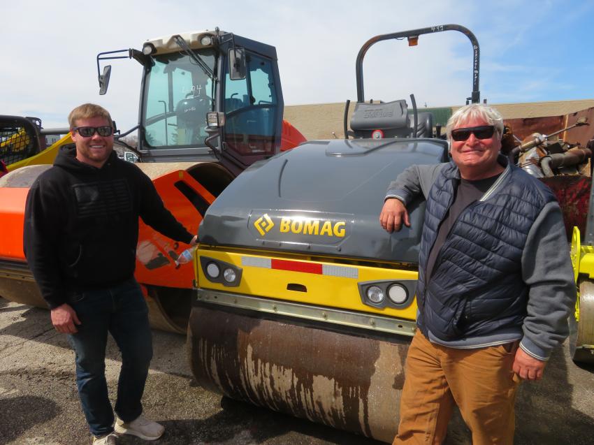 Dalton (L) and Jeff Gavers of Gavers Pavers Inc. hoped to take home a Bomag BW138 roller.
