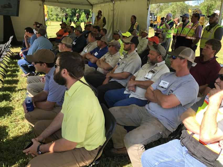 Attendees listen to a presentation on the Next Generation of Cat excavators, which are built to accommodate a wide range of job requirements. Whether the focus is driving down cost per hour, raising the bar on performance and fuel efficiency or hitting big, bold production and cost targets, there’s a new Cat excavator ready.