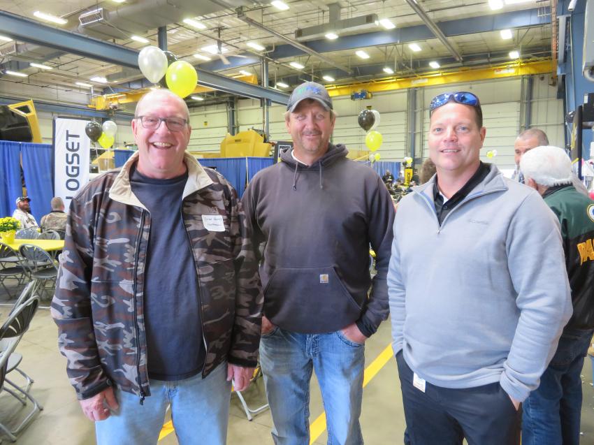 (L-R): Enjoying the barbeque lunch are Brian Burns and Paul Werner, both of Hoffman Construction, and Tom Muehlenkamp of Fabick Cat.
