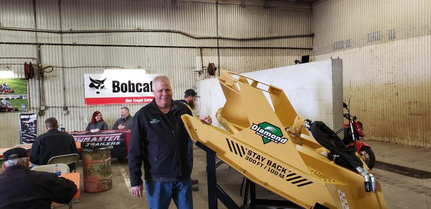 Paul Schreurs, regional sales manager at Diamond Mowers, Sioux Falls, S.D., answered questions about the company’s new 72-in. drum mulcher and other Diamond products at the St. Cloud open house.