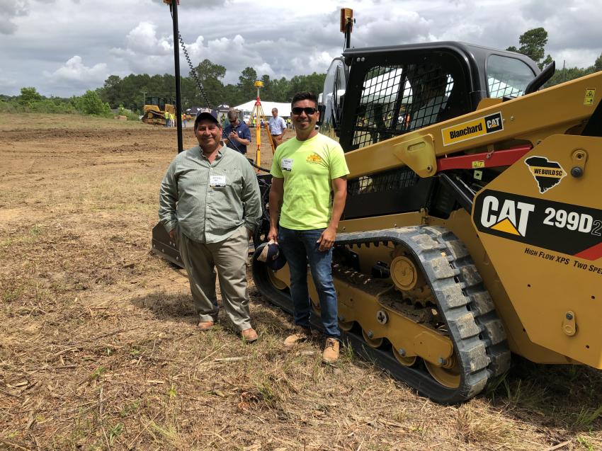 Checking out the Cat 299D are Miguel and Nerari Real of Casarez Construction in Myrtle Beach, S.C.
