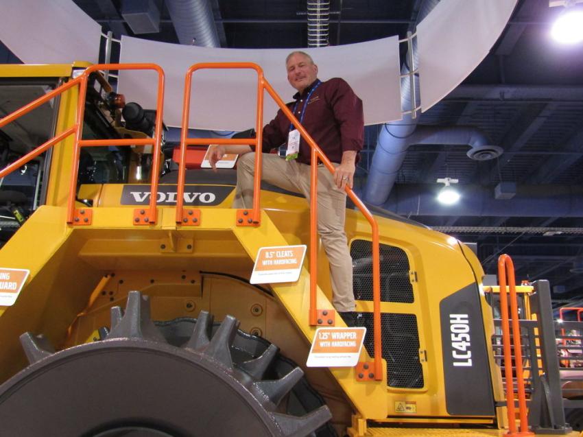 Volvo Construction Equipment’s Rob Palermo stands atop a LC45OH landfill compactor. The 90,000-lb. LC450H is powered by a 416-hp Volvo D13J Tier IV Final engine and offers excellent fuel efficiency.
