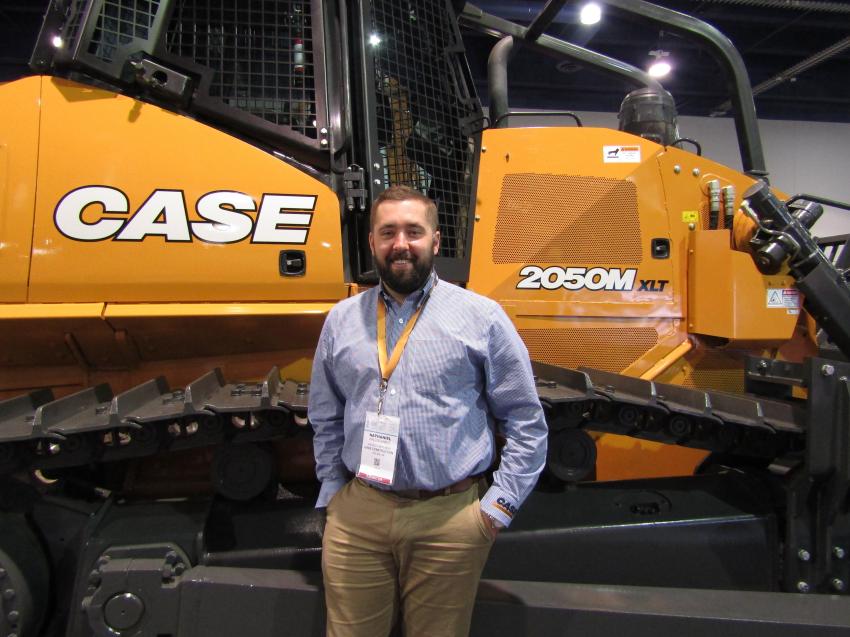Nathaniel Waldschmidt, product marketing manager, Case Construction, displays the 2050M XLT, the largest dozer in the Case lineup.
