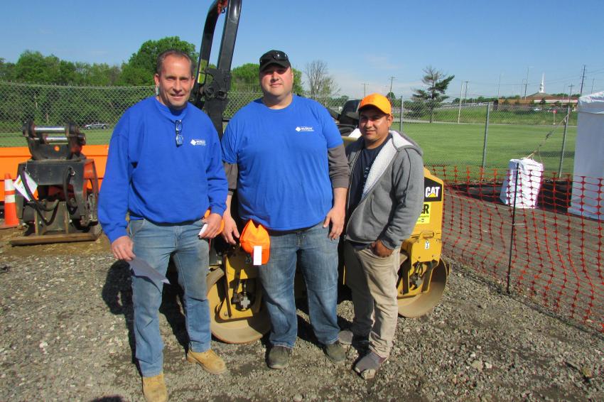 (L-R): Sean Jones, Bryan Barsa and Jonas Guerra, all of Murray Paving and Concrete, Hackensack, N.J., had already purchased an excavator and skid steer by the time this photo was taken. They were also interested in this Cat CB14B roller.