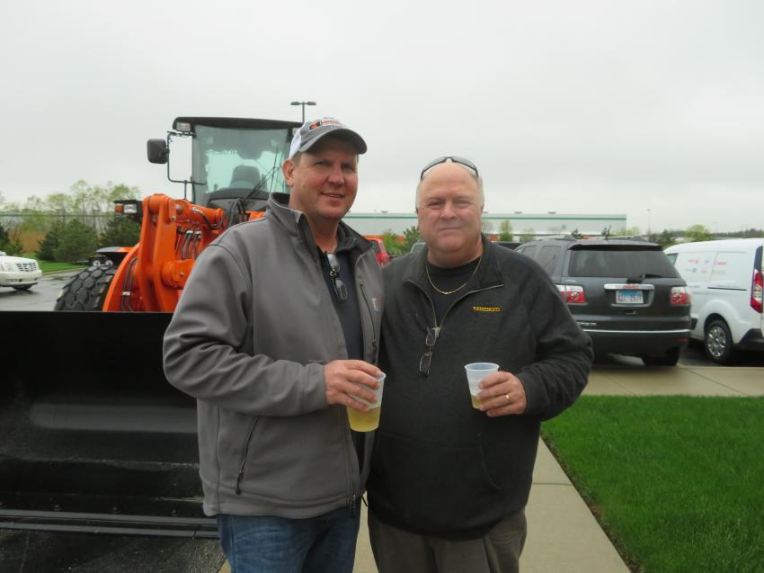 Ted Stipanovich (L) of Stip Brothers Excavating Inc. and Tim Kanive of Rental Max pause for a picture.
