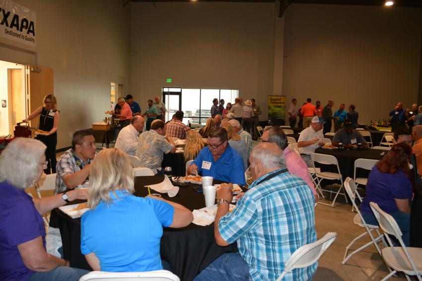 TXAPA members enjoy lunch at the open house.