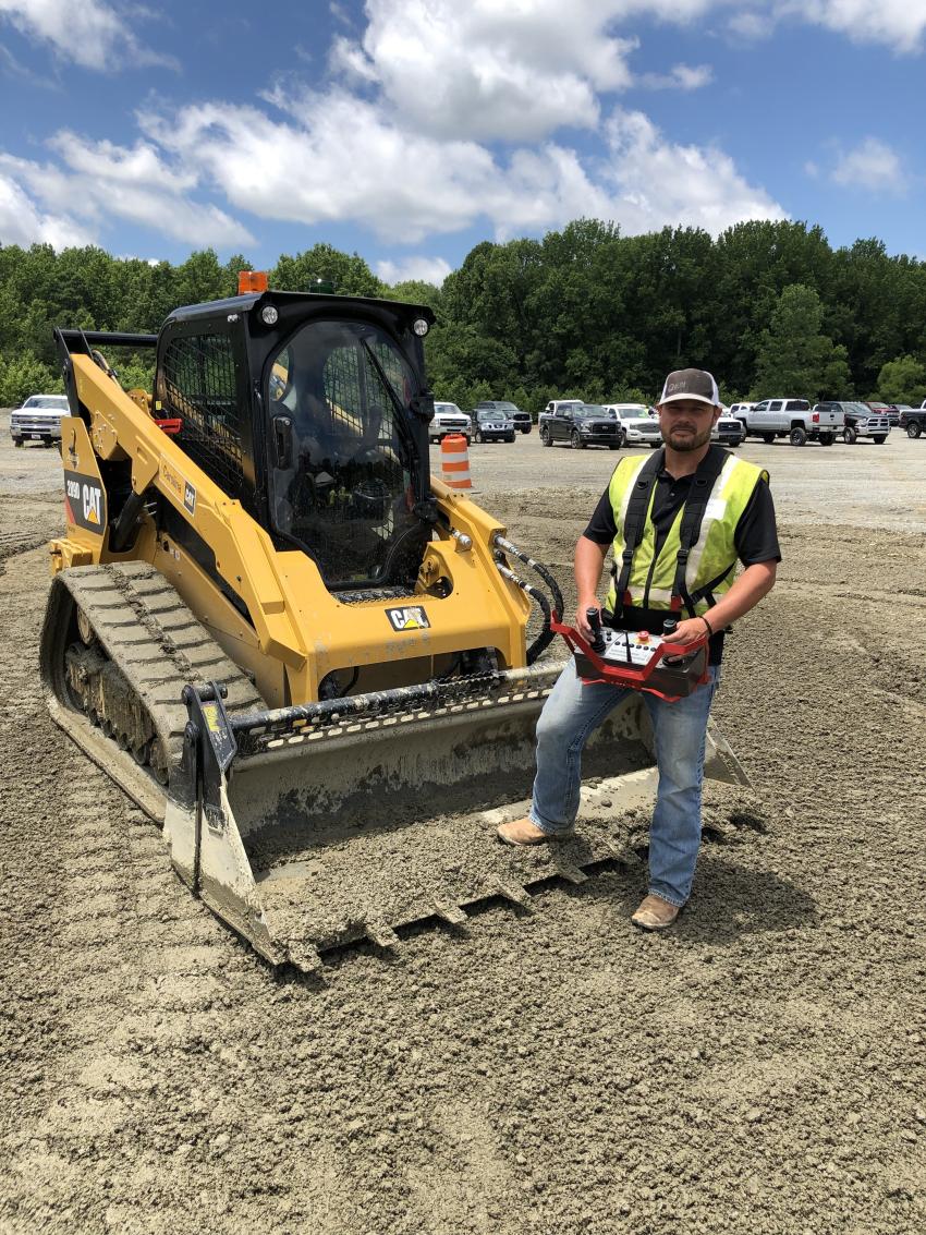 Brian Allen of Allen’s Grading in Monroe, N.C., tests out the fully remote-controlled Cat 289D compact track loader.