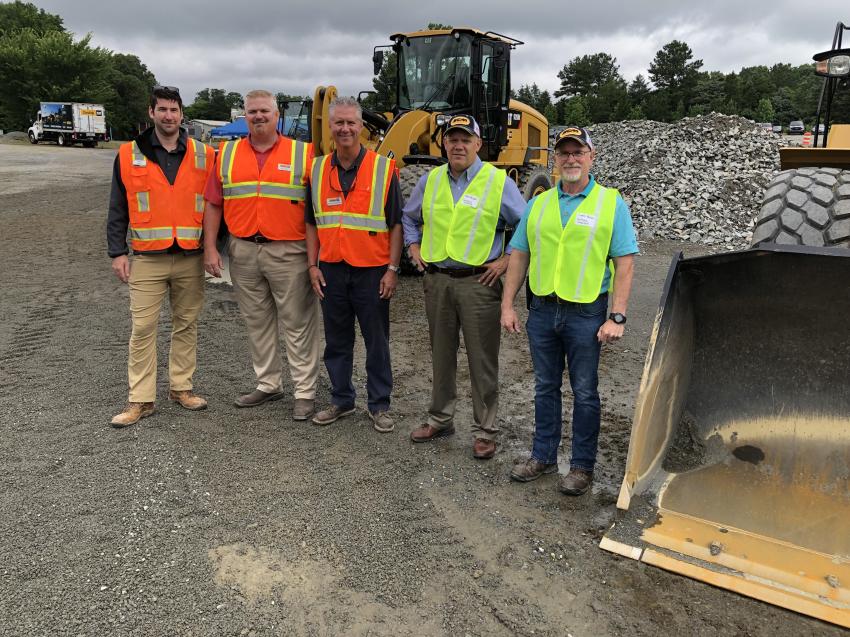 Talking Cat wheel loaders (L-R) are Andy Massey, Caterpillar; Mike Kunz and Mitch Christenbury, Carolina Cat; John Bryson and Donnie Parsell, Southern Concrete materials in Asheville, N.C.	