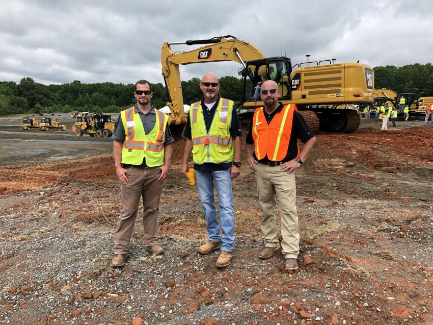 (L-R): John Williams and John Meade of Blythe Construction in Charlotte and Ryan Neal of Caterpillar.