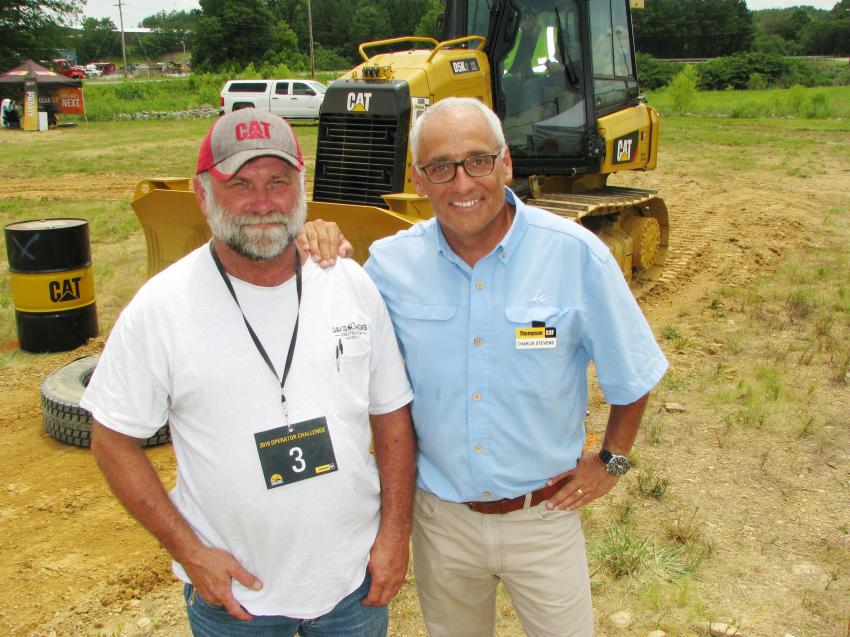 David Hicks (L) of David Hicks Construction, Hayden, Ala., and his old friend Charlie Stevens, Thompson Tractor’s vice president of sales, reminisce about an equipment competition from over 20 years ago where Hicks was a competitor and Stevens was in charge of that competition in the Thompson marketing department. 