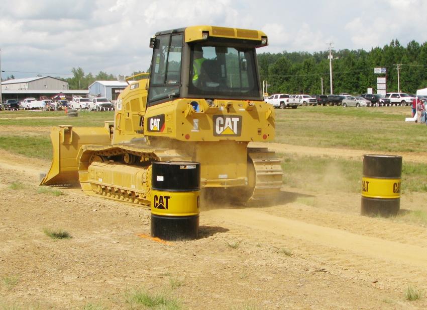 Another contestant kicks up some dust on a run through the dozer course operating a Cat D5K2 XL. 