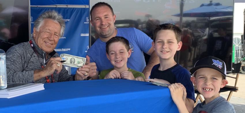 Racing legend Mario Andretti was spotted with Will Garrett and his boys at the Indy 500 with a $2 bill.
(Radiator Supply House photo)