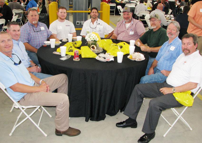 A big group having a great post-lunch conversation (L-R) are Lance Northam and Shawn Swain of ACIPCO, Birmingham, Ala.; Steve Seagle and Joseph Seagle of Morrow Railroad Builders, Birmingham, Ala.; Mike Sims, Warrior Tractor; Rob Reeder and Keith Harless of ACIPCO; Russell Morrow, Morrow Railroad Builders; and Ronnie Browning, ACIPCO. 