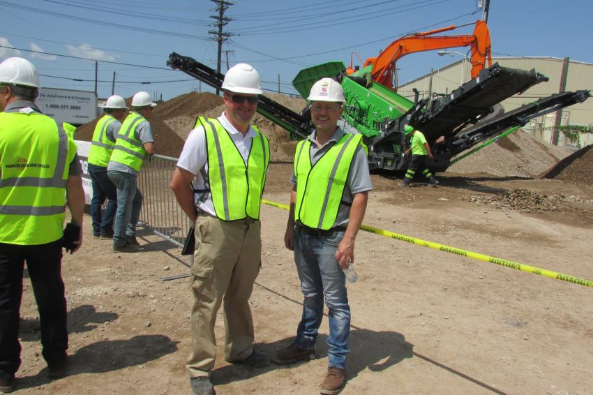 Matt Dickson, business line director of Terex Evoquip, stands with Brian McCammon, sales manager of Emerald Equipment Systems during the event.

