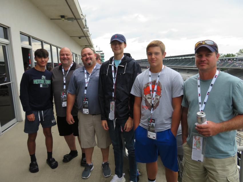 (L-R): Enjoying the Brickyard 400 are Connor and Ken Stone; Steve and Landon Farmer; and Thomas and Tom Sander of Metro Ports.
