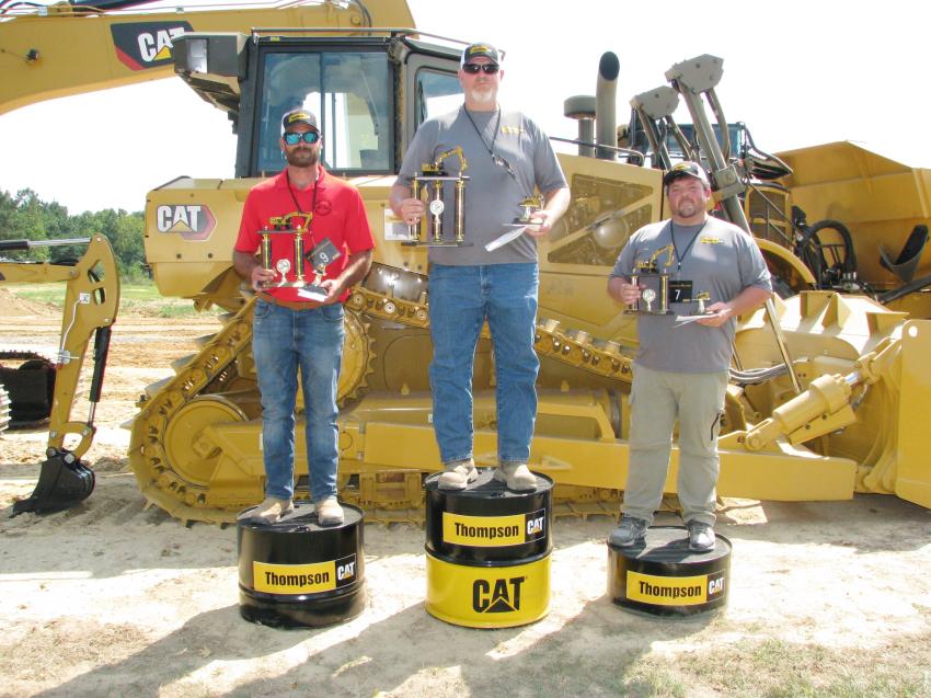 The Olympic style podium was set and the winners (L-R) were 2nd place: Lee Curtis of Kelley’s Welding & Excavation, Elberta, Ala.; 1st place: Jonathan Hagood of Stein Incorporated, Decatur, Ala.; 3rd place: Jonathan Womelsdorf of Integrity LLC, Moody, Ala.