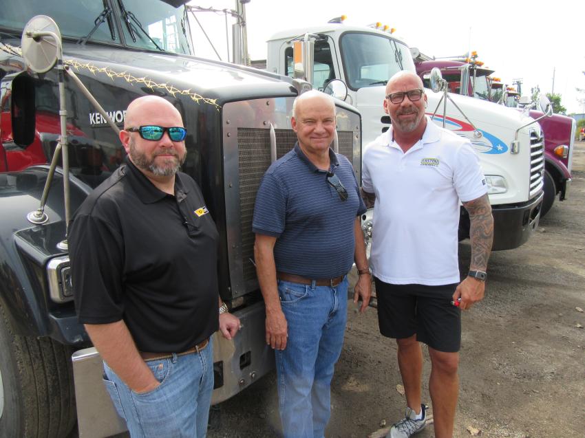 (L-R): Ohio Cat’s Matt Mahnen joined his father, Larry Mahnen, of National First Equipment and Steve Udelson of Easton Sales and Rentals to review the equipment up for bid.
