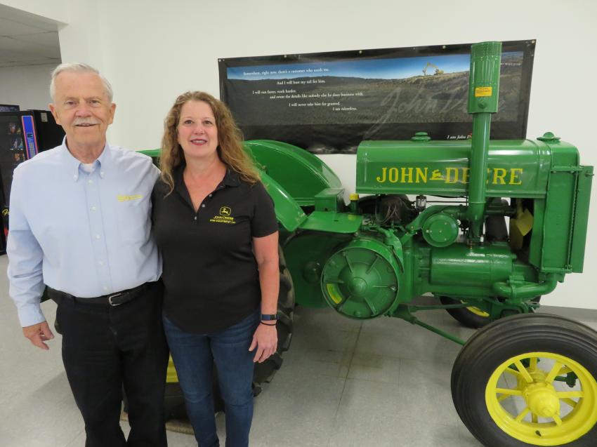 (L-R): Bob Erb, chairman, and Carrie Roider, CEO of Erb Equipment Co., are in front of a 1930 John Deere model D tractor.
