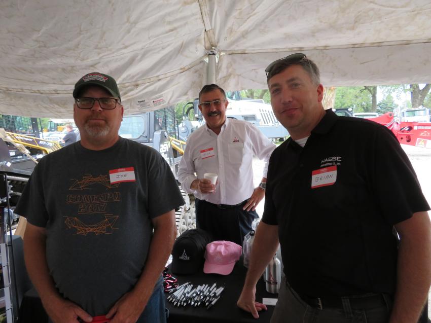 (L-R front): Joe Patrick and Brian Staresina, both of Hasse Construction Co. Inc., say hello to Nick Vermet, GM of Deutz Power Centers, and ask him some questions about Deutz engines. 
