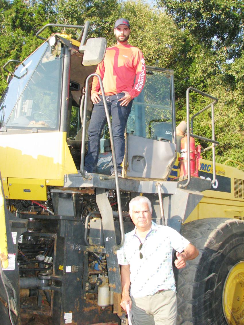 Giving this Komatsu WA500 loader their seal of approval and a thumbs up are Efrain Rojas, Jr. (above) and Efrain Rojas, Sr. of Rojas Heavy Equipment, Alamo, Texas.