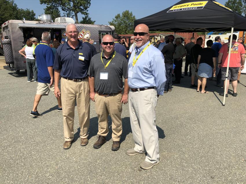 (L-R): Eddie Williford of Gregory Poole Equipment Company with Christopher and David Stike, both of Sanford Contractors in Sanford, N.C.