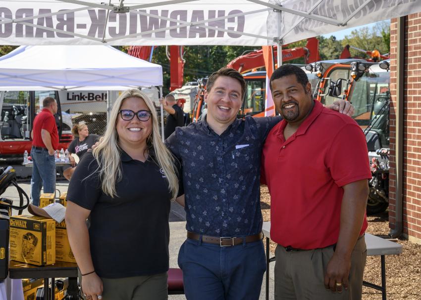 (L-R): Kristen Brunelle, inside sales and rental coordinator; Jacob Adams, marketing manager; and Juan Ocasio, sales representative, all of Chadwick-BaRoss, take time for a photo at one of the prize tents.