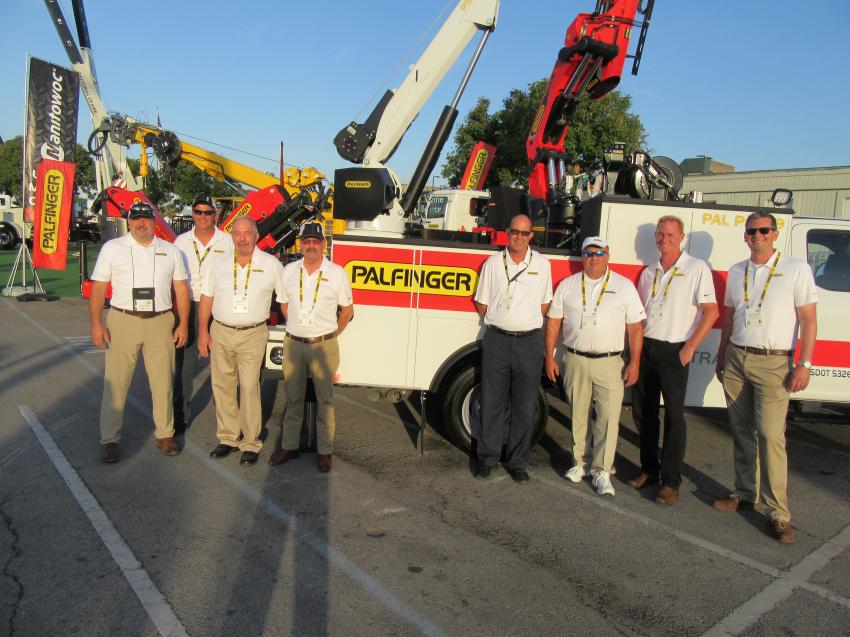 (L-R): Representatives from Palfinger Inc., Bill Boner, Jason Jankowski, Randy Fleck and Keith Giar were joined by representatives from Omaha Standard Palfinger, Anthony Gentile, Keith Ball, Jason Mayberry and David Phillips at the company’s outdoor equipment display.