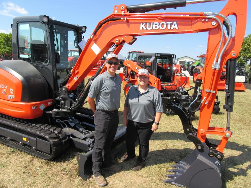 Kubota’s Garrett Leeds (L) and Patricia Sislar had a wide range of equipment to talk about at the Farm Science Review.
