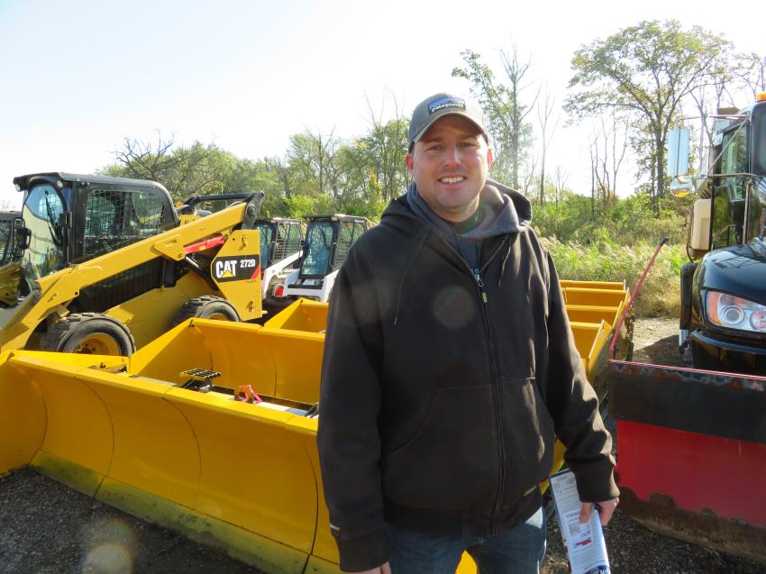 Derek Liles, co-owner of Central Illinois Equipment Sales Inc. in Hennepin, Ill., looks over the snow removal equipment up for auction at the Oct. 12 sale.
